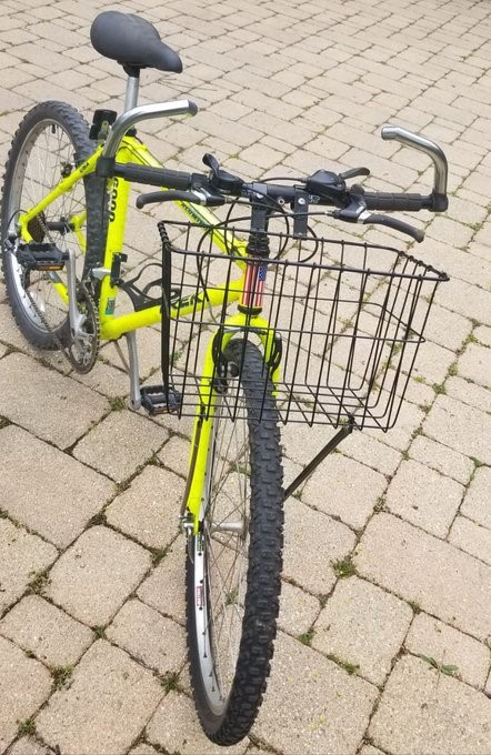 yellow mountain bike with front basket